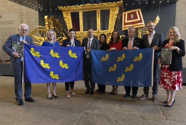 People holding Sussex flags